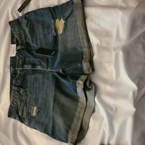 Brand new with tags, a.n.a. denim shorts. Size 29/8.